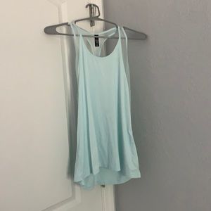 Light blue workout tank top with a mesh backing